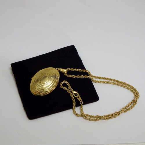 Gold colour photo pendant and necklace in bag