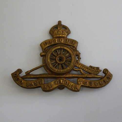 Royal Artillery cap badge with loose wheel - brass with slide