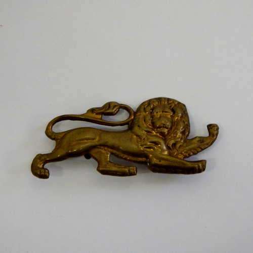 Great Britain The Kings own Royal Regiment cap badge with lugs