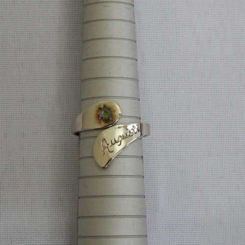 Ring with August birthstone