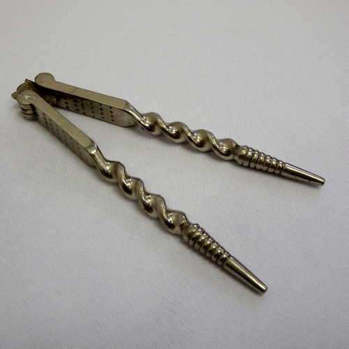 Vintage silver plated nutcracker with barley twisted handles