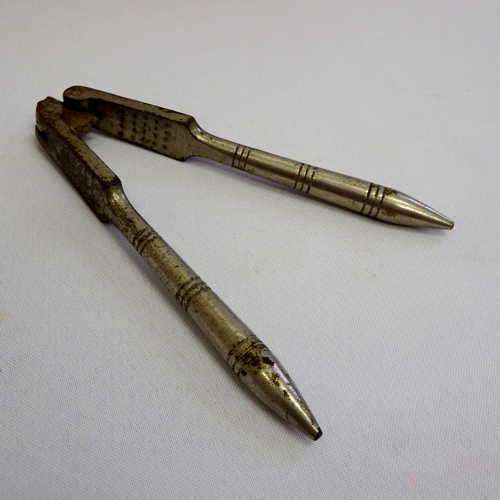 Vintage silver plated steel nutcracker
