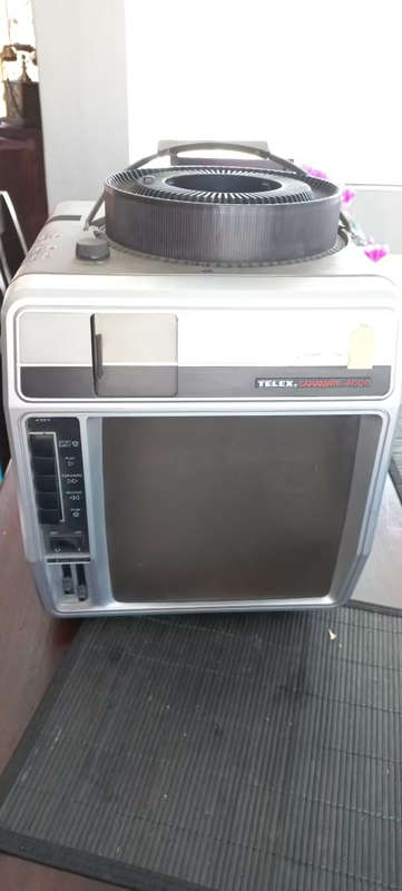 Slide viewer telex
