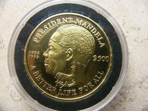 Mandela Nelson better life for all series 1oz 24ct gold coin.
