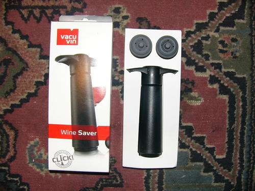 Wine saver vacuum pump for preserving opened wine.