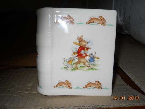 BUNNYKINS money box with bunnies dancing round a snowman.