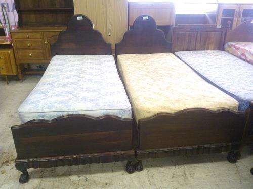 Pair of Ball and Claw single beds