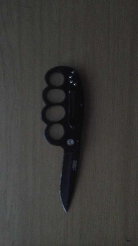 Knuckle Duster With slide out Knife