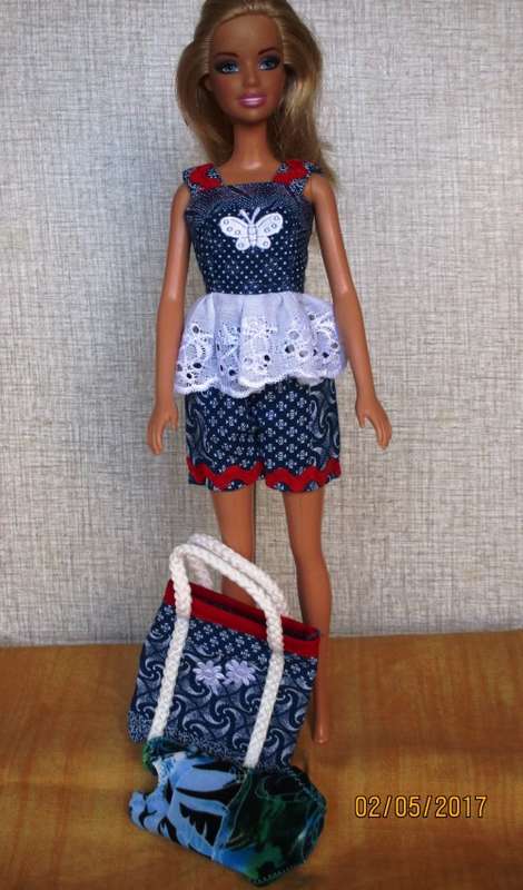 Barbie shorts, top, beach bag and bathing costume.