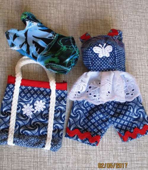 Barbie shorts, top, beach bag and bathing costume.