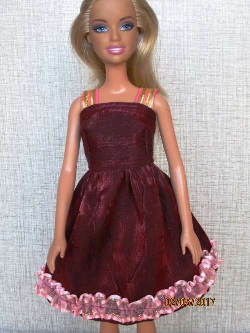 Barbie party dress in wine red satin with pink trim.