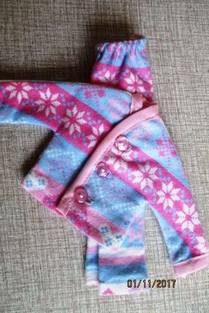 Barbie winter flannelette PYJAMAS in pink and blue print.