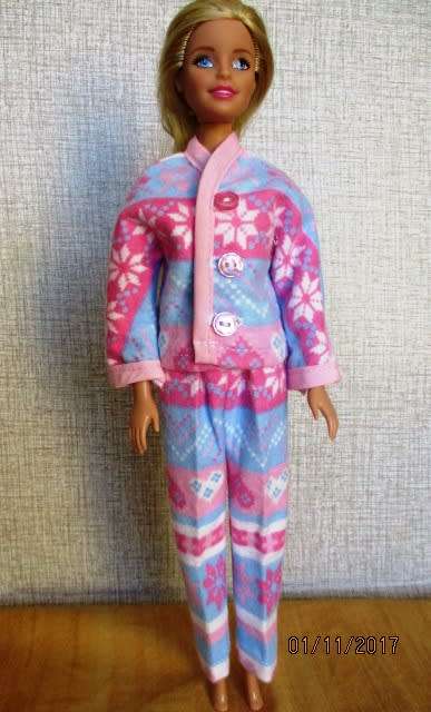 Barbie winter flannelette PYJAMAS in pink and blue print.