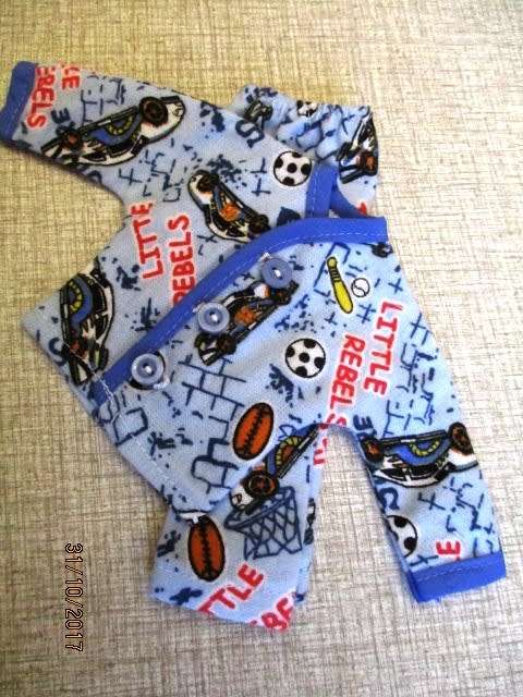 Ken - Barbie - winter PYJAMAS in blue sports print with blue binding.