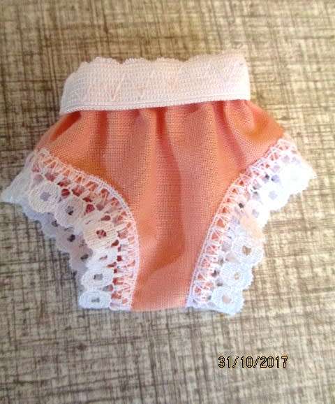 Barbie DRESS with belt n orange print.