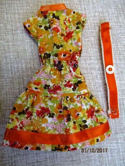 Barbie DRESS with belt n orange print.