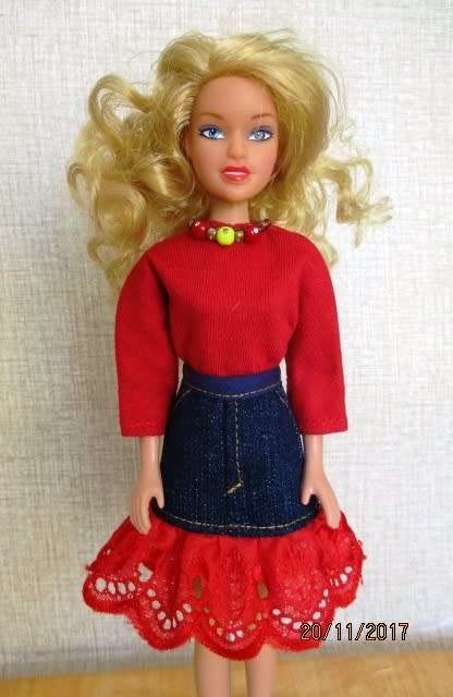 Barbie generic doll plus outfits.