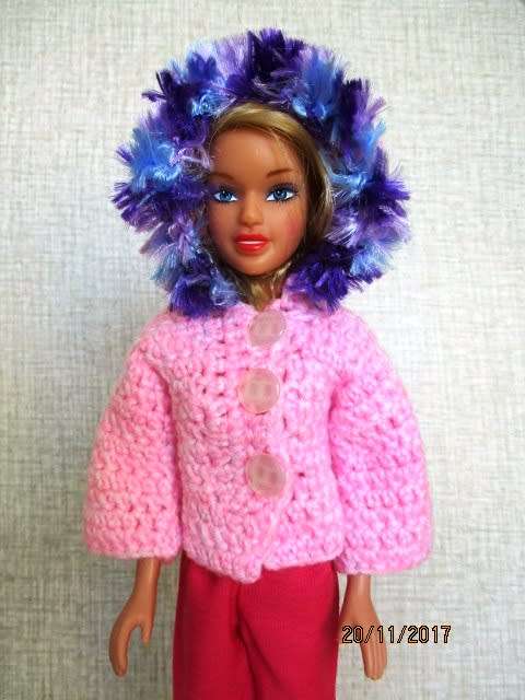 Barbie generic doll plus outfits.