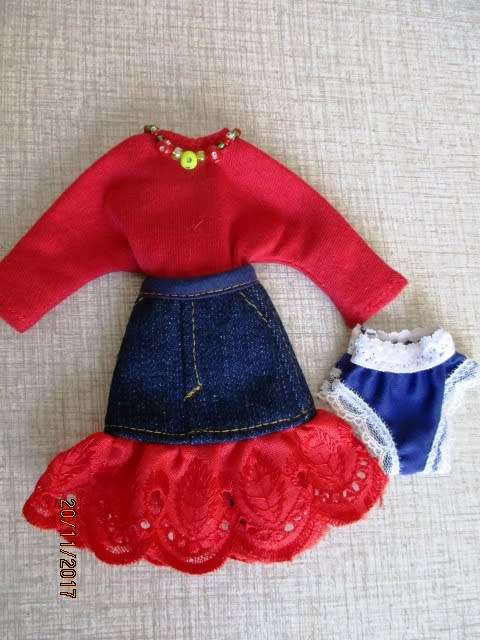 Barbie generic doll plus outfits.