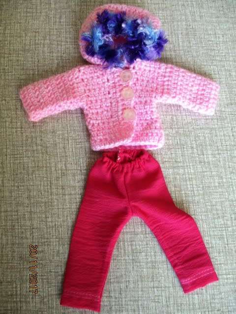 Barbie generic doll plus outfits.