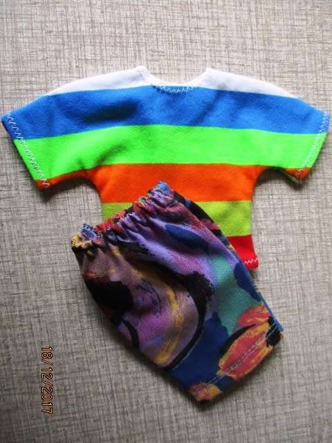 Ken - Barbie - shorts and striped T-shirt.