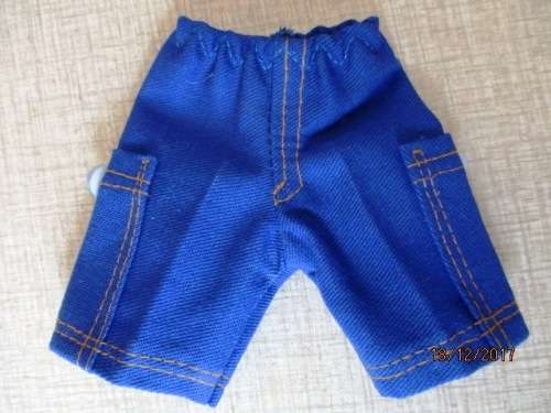 Ken - Barbie - blue shorts and striped T-shirt.