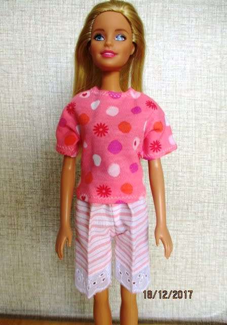 Barbie pink striped shorts and pink print T-shirt.