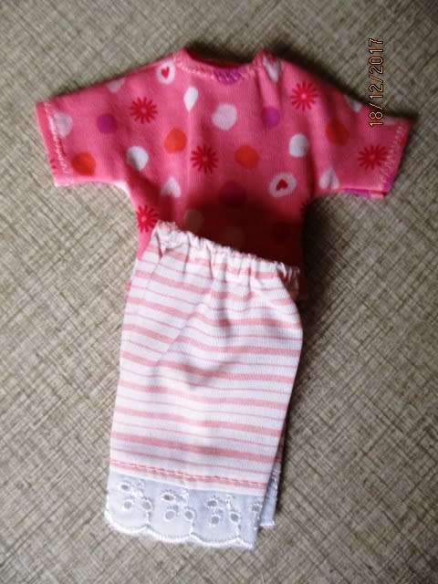 Barbie pink striped shorts and pink print T-shirt.