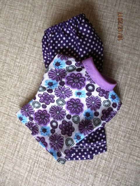 Barbie purple spot 3/4 pants and purple print top.