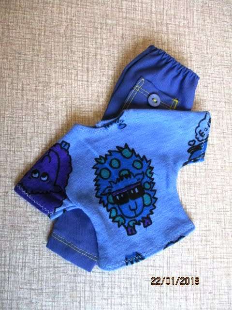 Ken - Barbie - blue cargo pants with sunglasses sheep print.