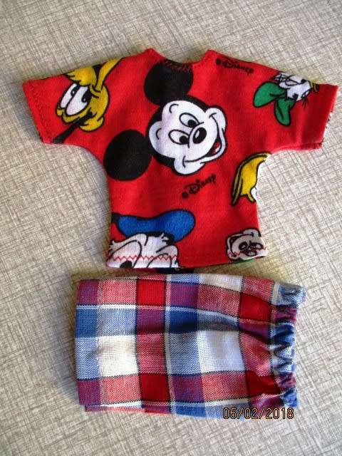 Ken - Barbie - red check shorts plus Mickey Mouse T-shirt.