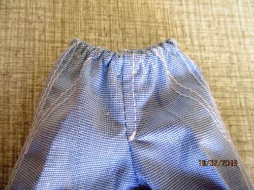 Ken - Barbie - light blue PANTS with pink stripe T-SHIRT.