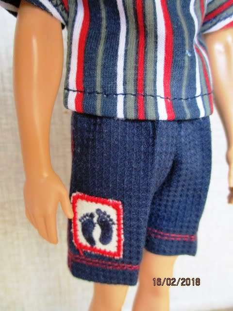 Ken - Barbie - navy SHORTS with feet motif and striped T-SHIRT.