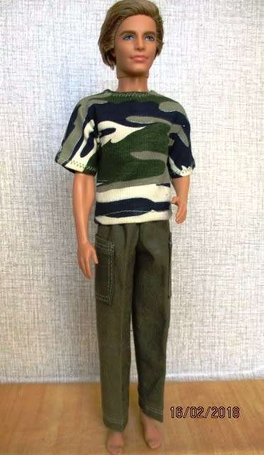 Ken - Barbie - doll's olive green cargo pants and camouflage T-shirt.