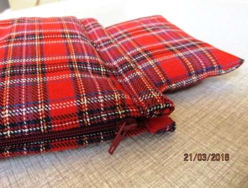 Ken sleeping bag in red check.