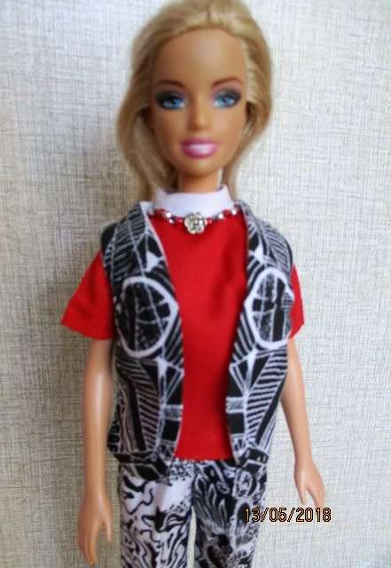 Barbie doll's black and white print pants with red shirt (attached necklace)