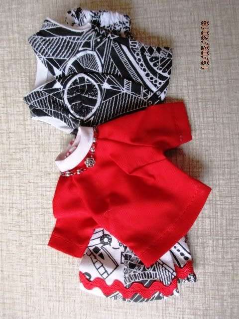 Barbie doll's black and white print pants with red shirt (attached necklace)
