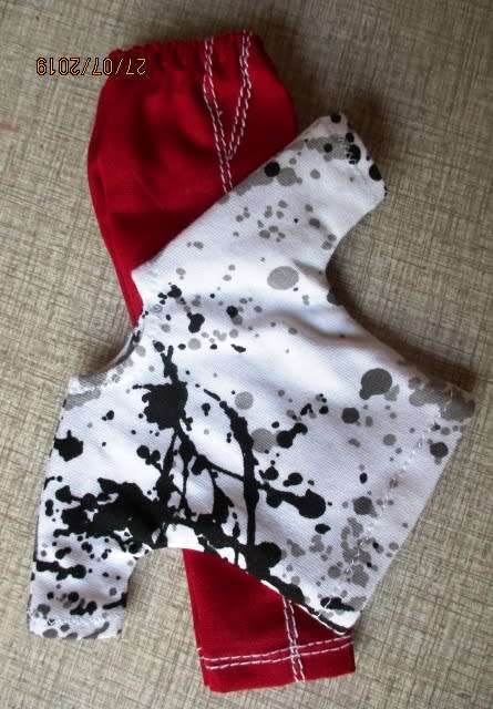 Ken doll's red pants with black and white print Tee