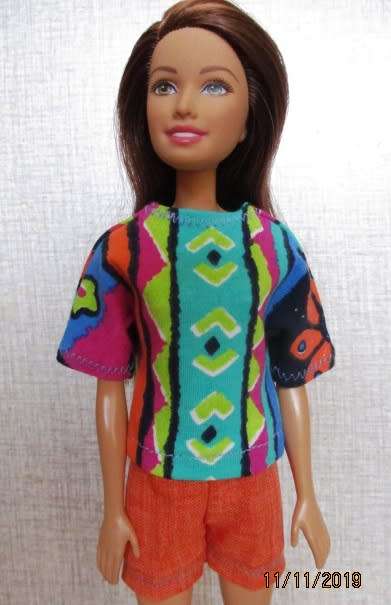 Barbie doll's shorts and bright print T-shirt