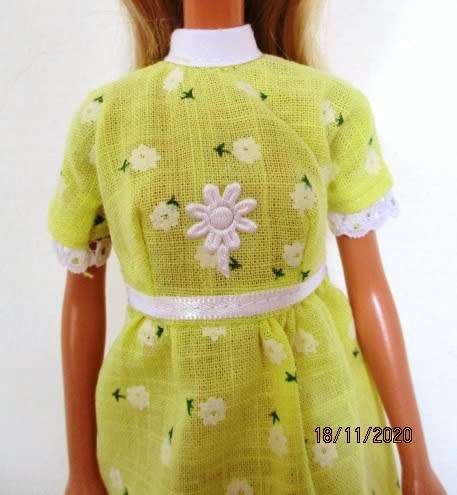 Barbie doll`s short sleeved dress - yellow flower