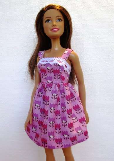 Barbie doll`s pink tulip print dress