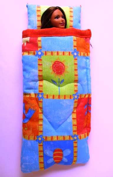 Barbie doll`s sleeping bag - blue and orange print