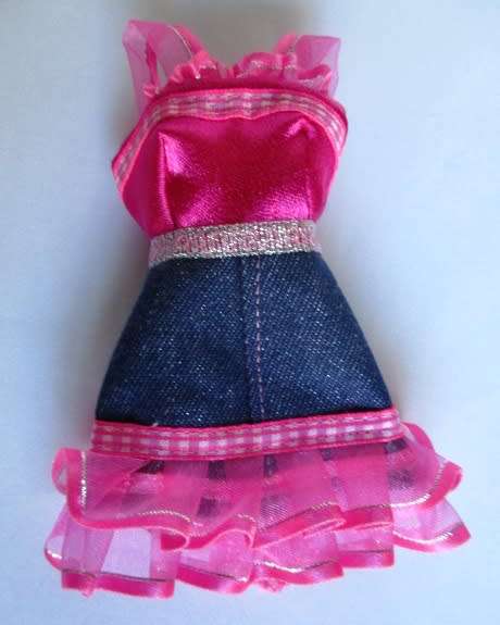 Barbie doll`s denim and pink ribbon dress
