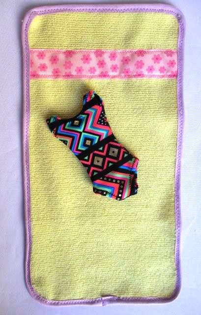 Barbie doll`s bathing costume and beach towel - brights with yellow towel