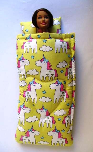 Barbie doll`s sleeping bag - yellow unicorn clouds