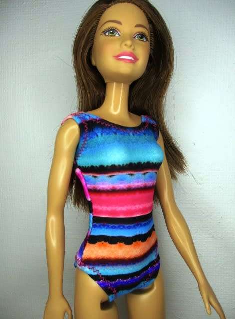 Barbie doll`s lycra bathing costume and beach towel - bright stripe