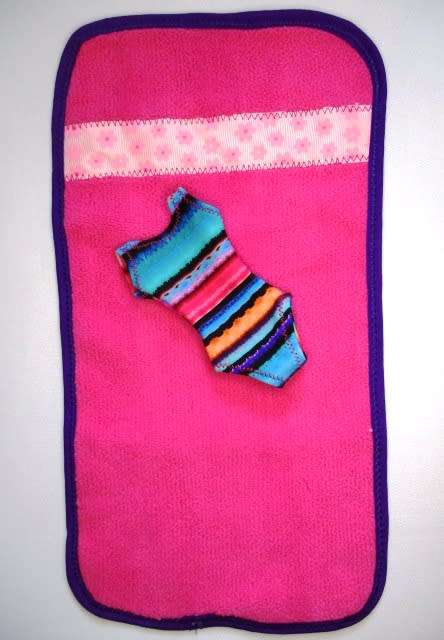 Barbie doll`s lycra bathing costume and beach towel - bright stripe
