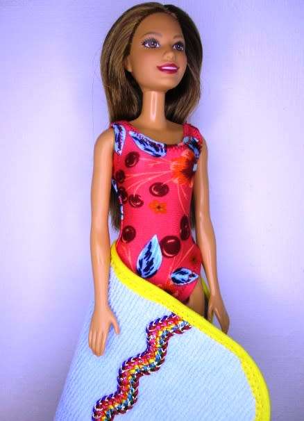 Barbie doll`s lycra bathing costume and beach towel - red print