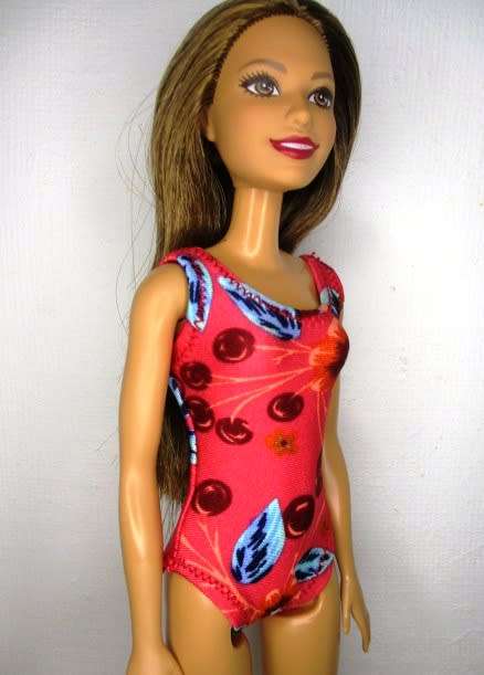 Barbie doll`s lycra bathing costume and beach towel - red print
