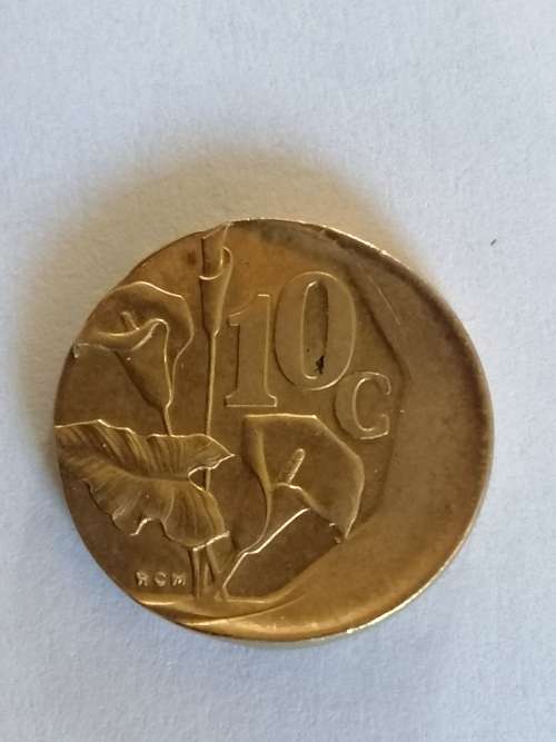 Off center strike error 1993 10 cent coin
